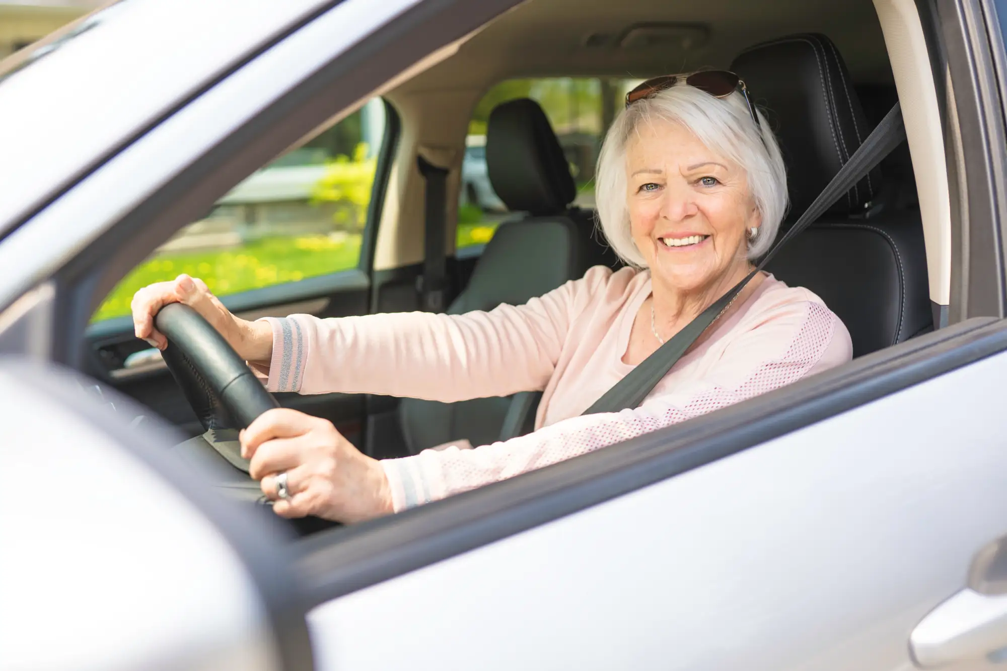 Woman driving after shoulder replacement surgery