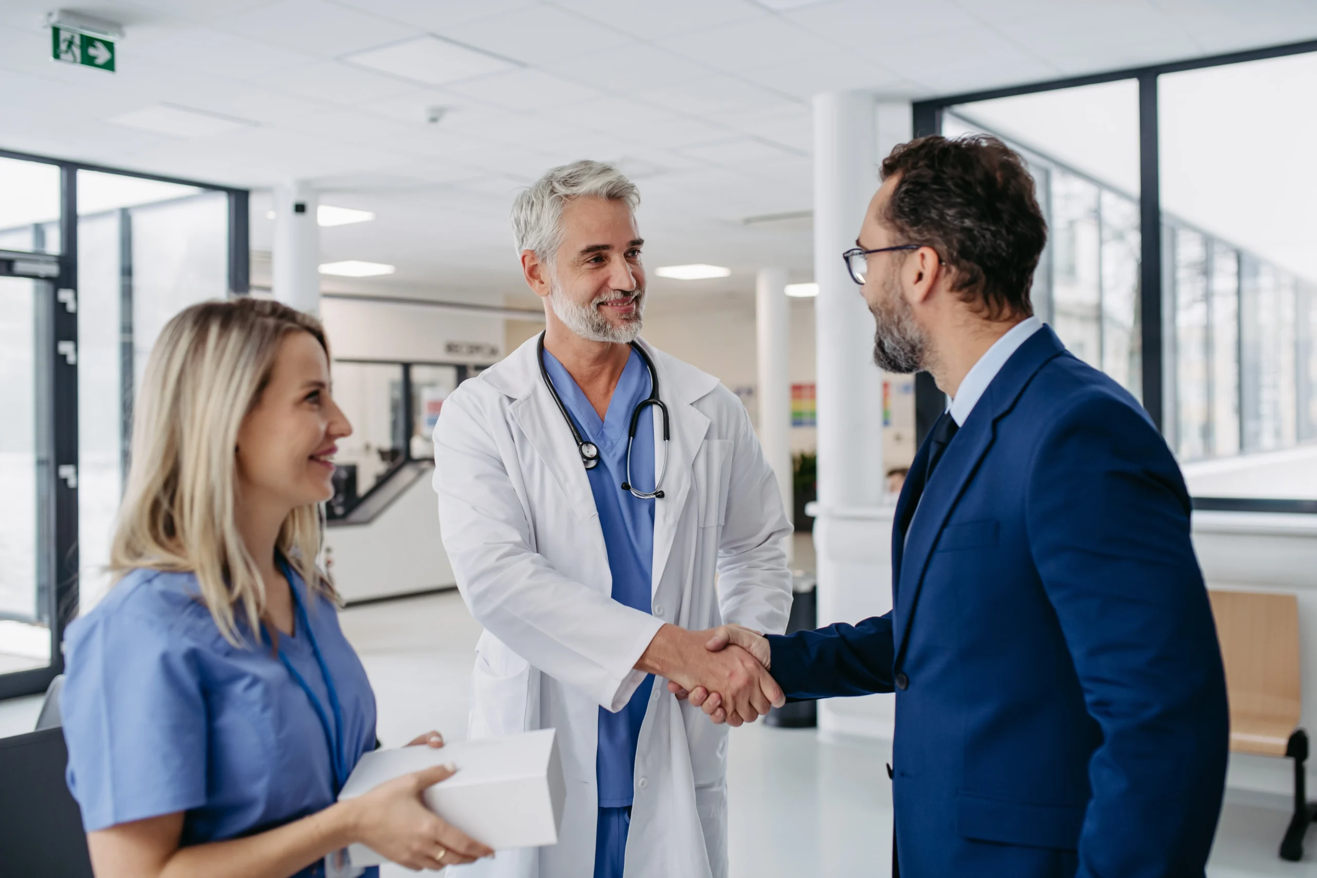 A patient meeting his doctor before the rotator cuff surgery